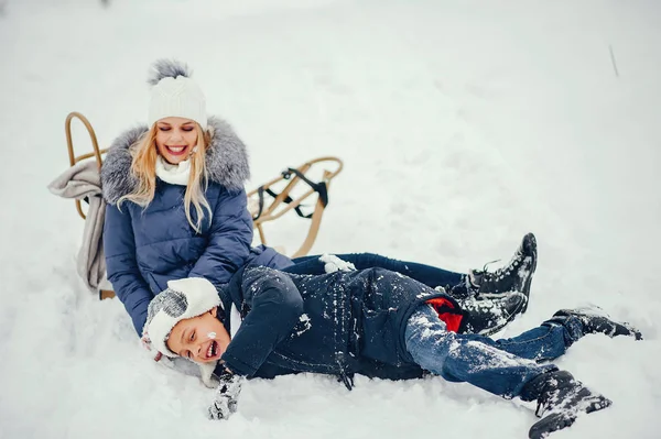 Mother with cute son in a winter oark — Stock Photo, Image