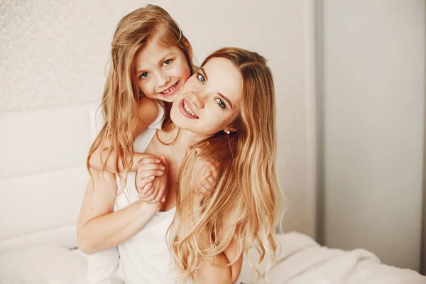 Mother with cute blond daughter — Stock Photo, Image