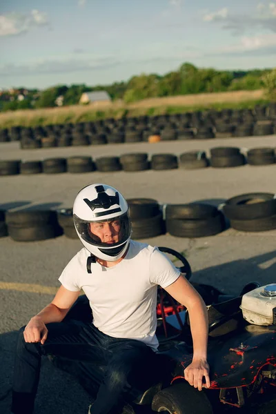 Handsome man in a karting with a car — Stok fotoğraf