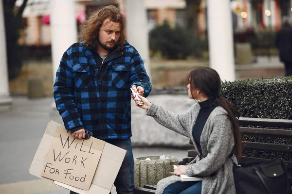 Homeless man in a durty clothes autumn city — Stock Photo, Image