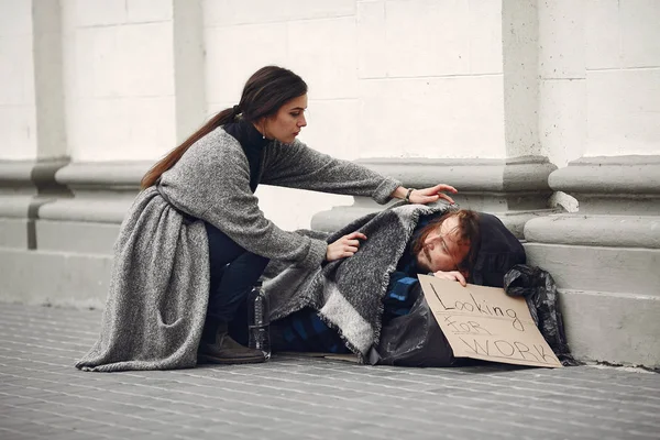 Homeless man in a durty clothes autumn city — Stock Photo, Image