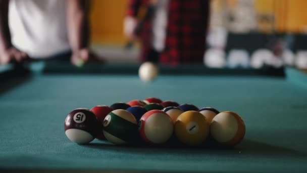 Cropped view of billiard balls on pool table in club — Stock Video