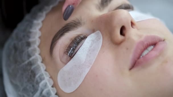 The professional lash maker is doing the lamination of the eyelashes — Stock Video