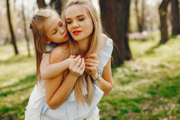 Elegant mother with cute daughter — Stock Photo, Image