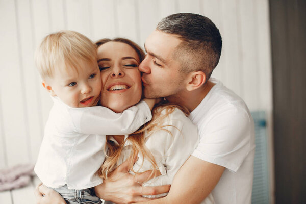 Cute and big family sitting at home