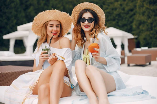 Two elegant girls on a resort — Stock Photo, Image