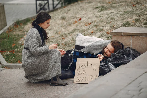 Homeless man in a durty clothes autumn city — Stock Photo, Image