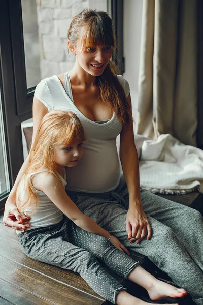 Mother with daughter at home — Stock Photo, Image