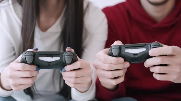 Video games controllers are in the couples hands — Stock Video