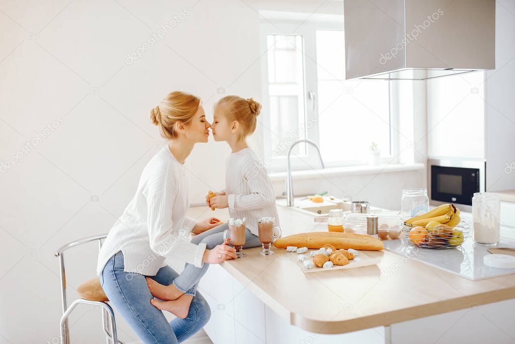 mother with cute blond daughter
