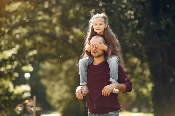 Cute family playing in a autumn park — Stock Photo, Image