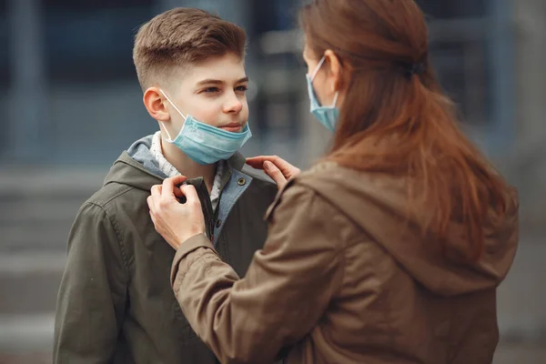 A boy and mother are wearing protective masks — Zdjęcie stockowe