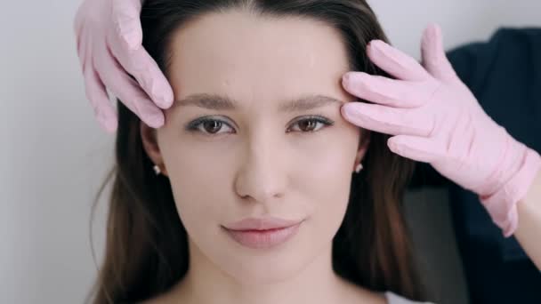 Closeup of woman having facial massage in beauty salon — Stock Video