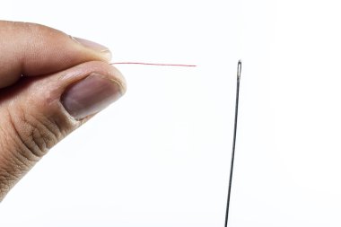 bir iğne threading adamın elini