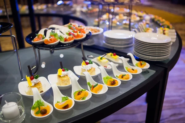 Close-up view of dessert buffet with delicious sweet bakery and