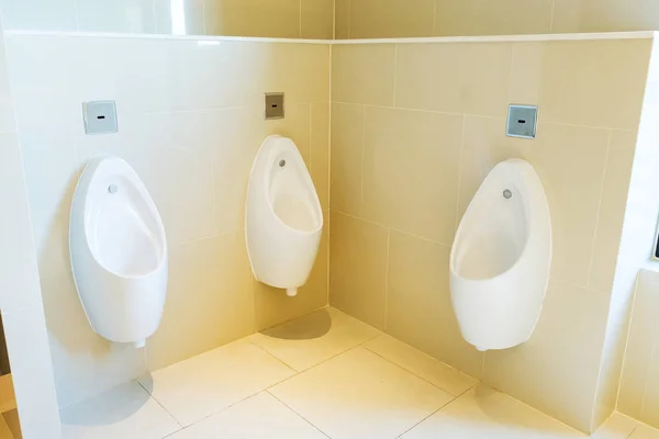 Urinals in public toilet — Stock Photo, Image