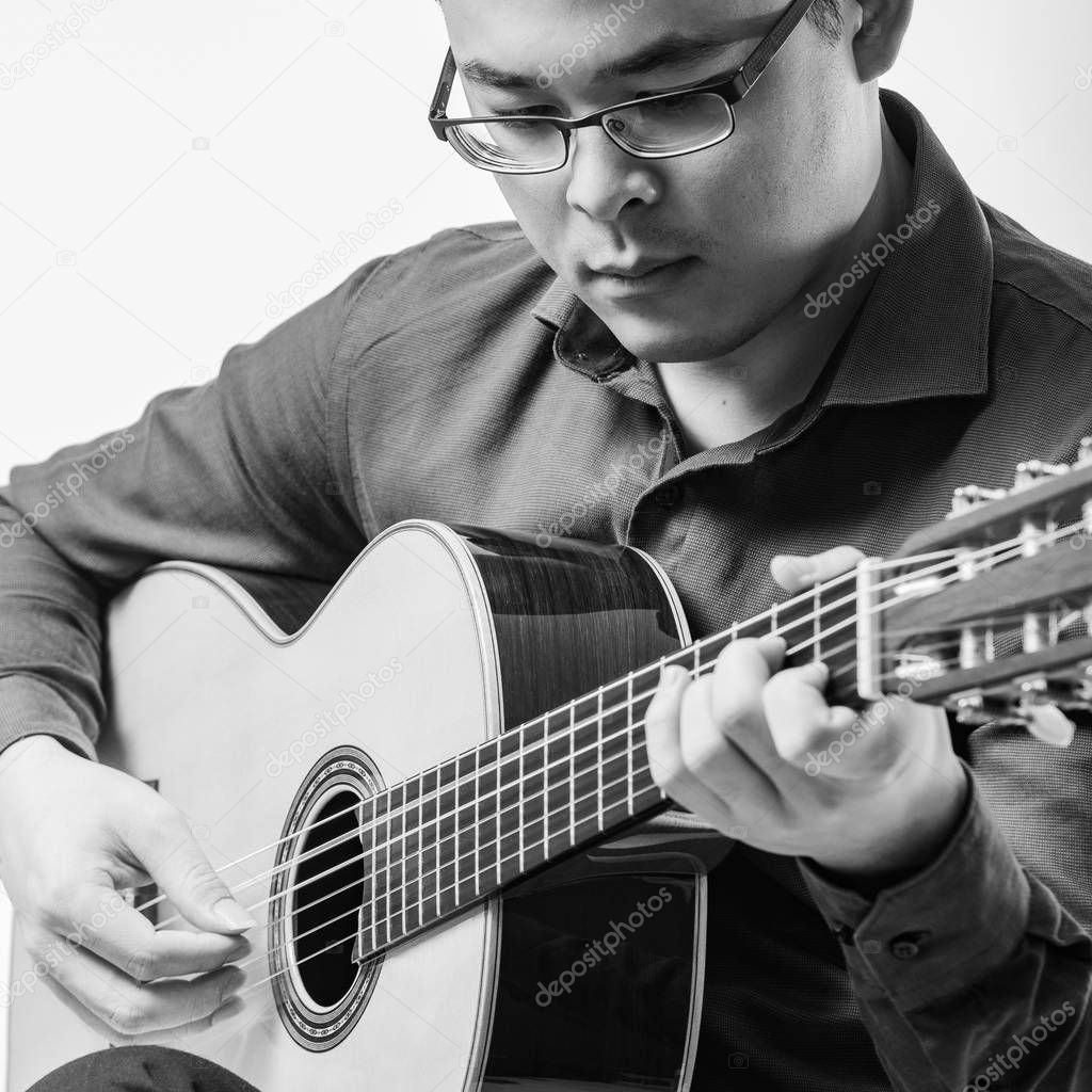 Man Playing Classic Guitar from THAILAND isolated for white background