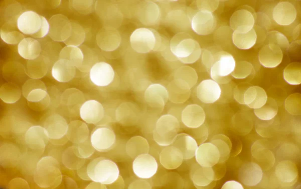 Bokeh dourado embaçado de Natal — Fotografia de Stock