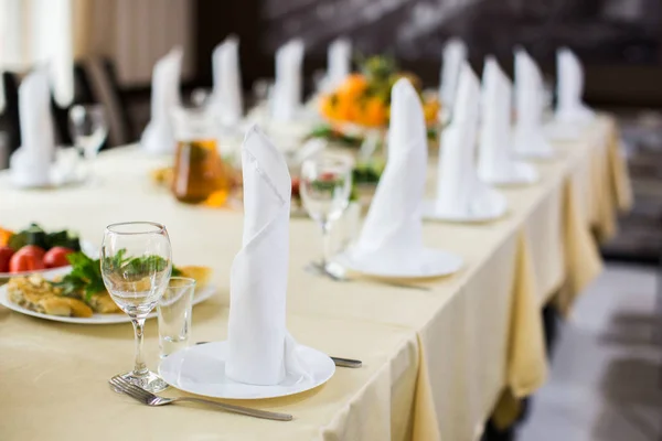 Banquet wedding table setting on evening reception Stock Image