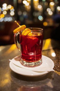 grenadine in a glass in a cafe on the table