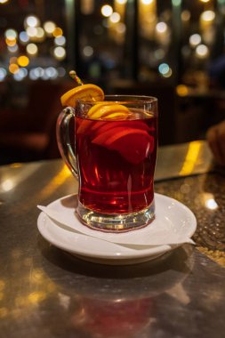 grenadine in a glass in a cafe on the table