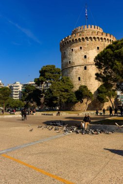 Thessaloniki, Greece - February 12 2020: White Tower, promenade in the afternoon