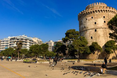 Thessaloniki, Greece - February 12 2020: White Tower, promenade in the afternoon