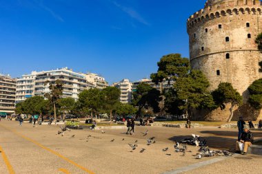 Thessaloniki, Greece - February 12 2020: White Tower, promenade in the afternoon