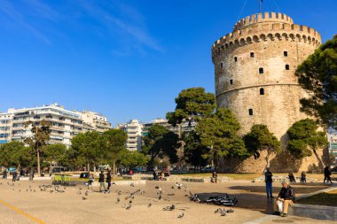 Thessaloniki, Greece - February 12 2020: White Tower, promenade in the afternoon