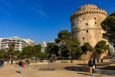 Thessaloniki, Greece - February 12 2020: White Tower, promenade in the afternoon