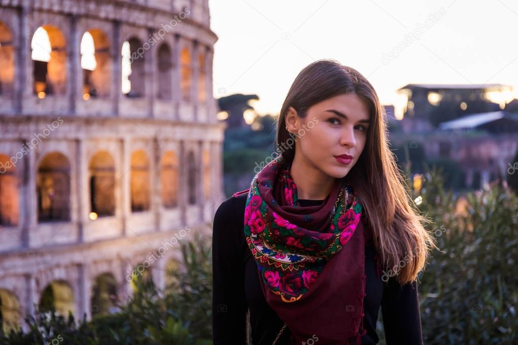 Russian girl with typical Russian traditional scarf, posing in f