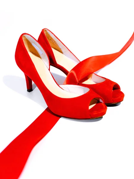 Red shoes, a symbol femicide — Stock Photo, Image