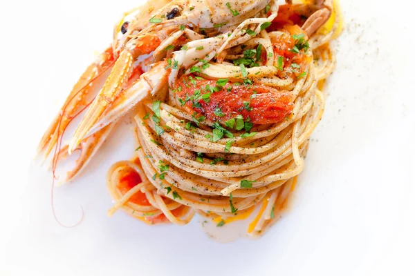 Spaghetti with tomato and Nephrops — Stock Photo, Image