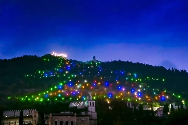 Christmas tree composed of colored lights and white comet star, — Stock Photo, Image