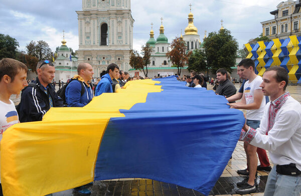 The world's largest flag of Ukraine was unfurled on Sophia Square in Kiev, August 23, 2017.