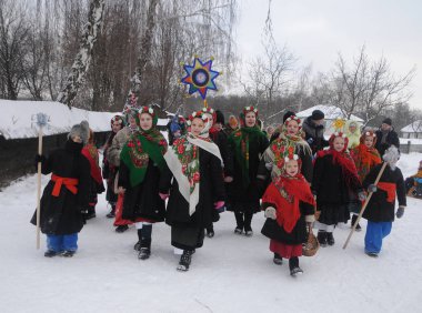 Christmas carols during the Christmas celebration at the National Museum of Folk Architecture and Life in Kiev, January 7, 2019.