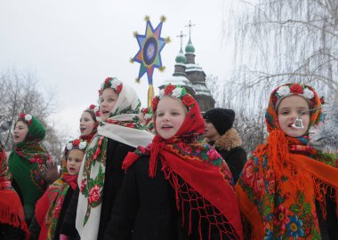 Christmas carols during the Christmas celebration at the National Museum of Folk Architecture and Life in Kiev, January 7, 2019.