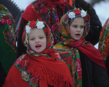 Christmas carols during the Christmas celebration at the National Museum of Folk Architecture and Life in Kiev, January 7, 2019.
