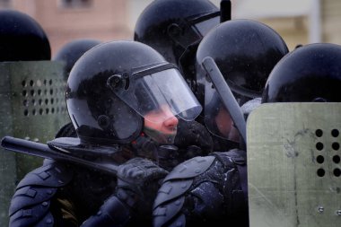 Barnaul, Russia-January 15, 2020. National guard soldiers train to suppress riots clipart