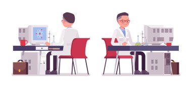 Masa başında çalışan erkek bilim adamı