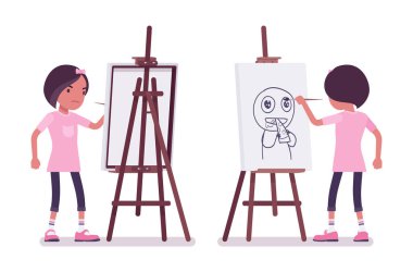 Liseli kız sanatçı sehpasında komik resimler çiziyor.