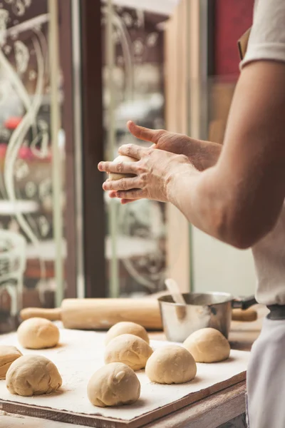 Making dough by male hands — Stock Photo, Image