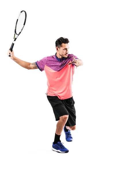 El joven está jugando al tenis. — Foto de Stock