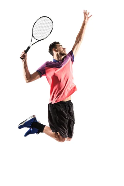 El joven está jugando al tenis. — Foto de Stock