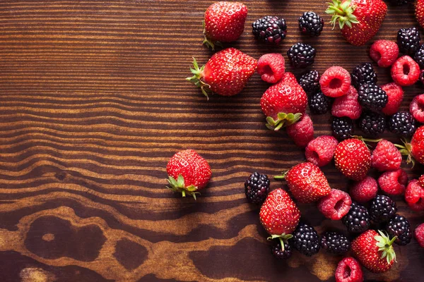 Summer fruits on a wooden table — Stock Photo, Image