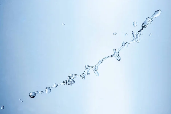 Salpicadura de agua en azul — Foto de Stock