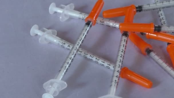 Pile of syringes for insulin — Stock Video