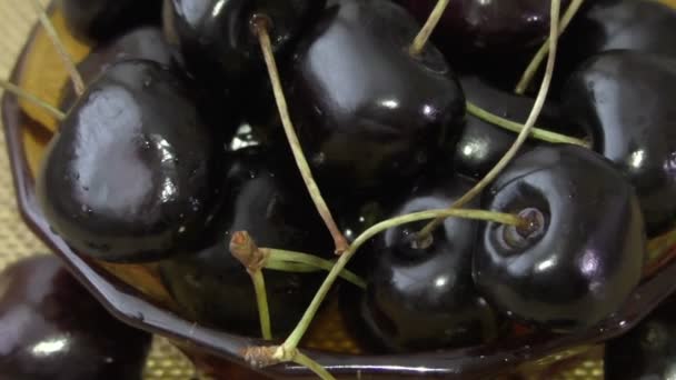 Sweet cherry in brown bowl — Stock Video