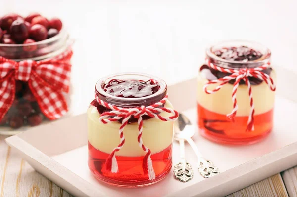 Tasty dessert - berry jelly with vanilla pudding and jellied berries. Selective focus. — Stock Photo, Image