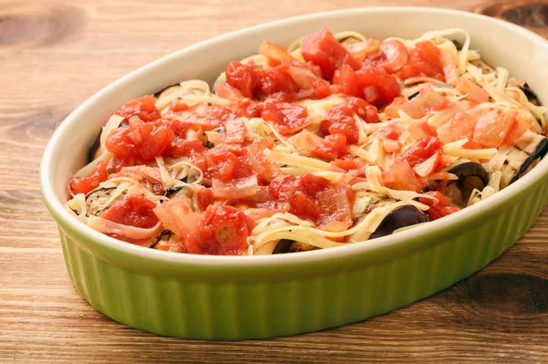 Casserole with roasted eggplants stuffed with minced meat. — Stock Photo, Image